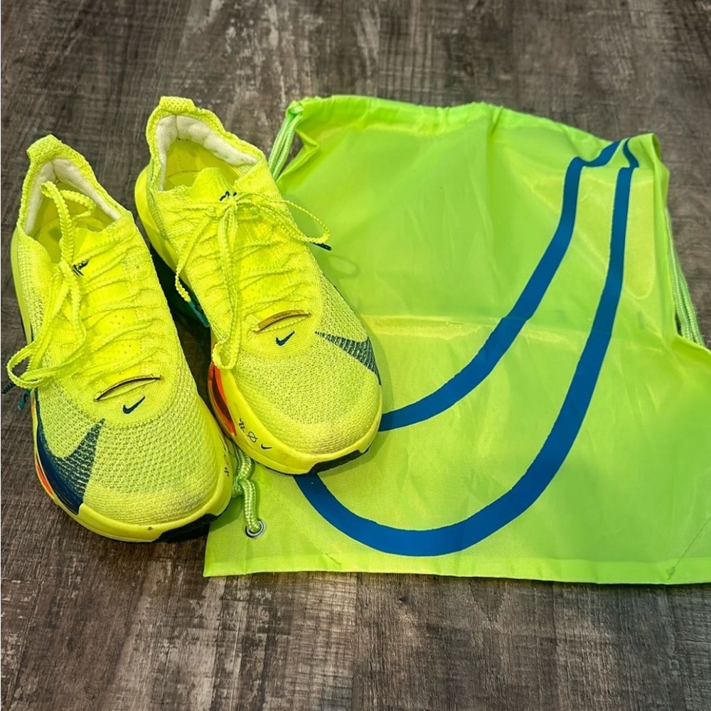 Nike Volt Green Running Shoes with Blue Accents